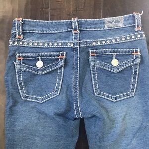 Virgin only boutique designer jeans with swarz crystals.